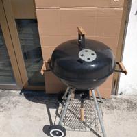 barbecue con carrello a carbonella rotondo