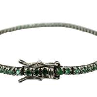 Tennis oro bianco e smeraldi