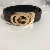 Cintura unisex Gucci  logo in GG  dorato
