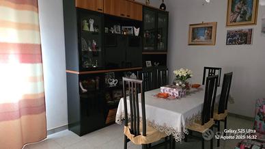 Tavolo in vetro con sedie