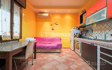 TRILOCALE CON TAVERNA, GARAGE E GIARDINO PRIVATO