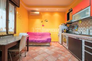 TRILOCALE CON TAVERNA, GARAGE E GIARDINO PRIVATO