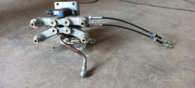 Distributore ausiliario circuito idraulico