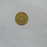 Moneta d'oro più piccola al mondo