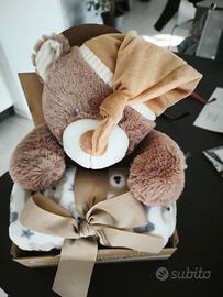 Peluche con copertina neonati