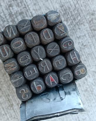 punzoni, scrittura, alfabeto