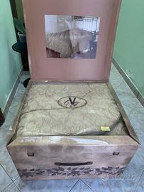 Piumone con cuscini decorativi