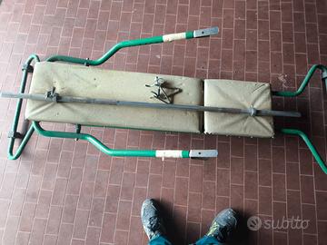 Panca, sacco e bilanciere con pesi