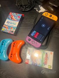Nintendo Switch OLED + 2 Giochi + Accessori