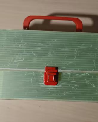 Valigetta vintage polionda verde e rossa