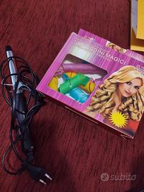 Piastra arricciacapelli e bigodini