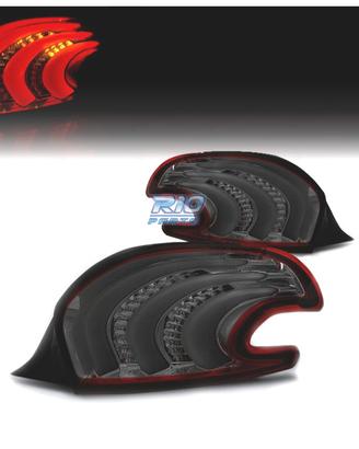 FANALI PER PEUGEOT 208 12-15 LIGHT BAR ROSSO FUMÉ
