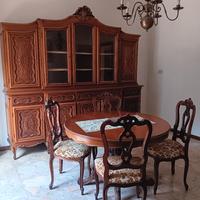sala completa di tavolo e sedie
