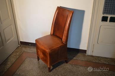 sedia in pelle antica imbottita