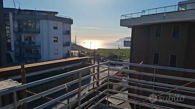 Attico con terrazzo panoramico vista mare