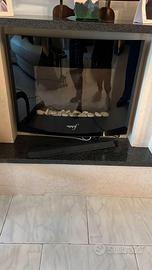 camino finto riscaldante con pietre e luce fuoco