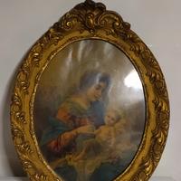 Quadro con cornice in legno dorata 