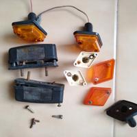 frecce romboidali + luci di retro e luci targa