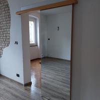 Porta scorrevole a specchio