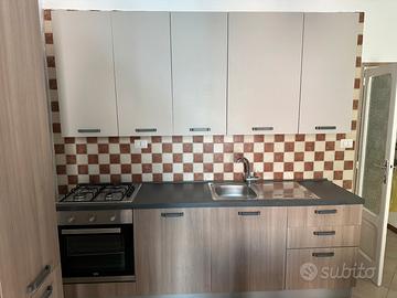 CUCINA E CAMERA DA LETTO