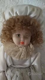 Bambola vintage con cuffia 25 cm

