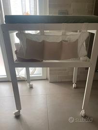 Fasciatoio erbesi con sacca porta oggetti