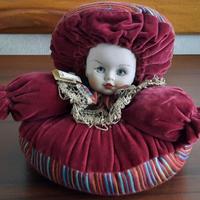 BAMBOLA IN PORCELLANA 