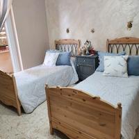 2 letti singoli in legno massello naturale