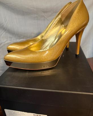 decoltè oro Gucci