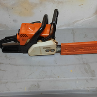 Motosega Stihl e fermo cancello