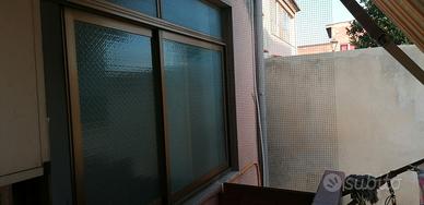 vetrata scorrevole alluminio 