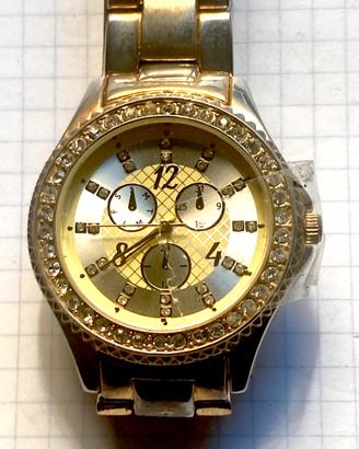 Orologio lusso oro e brillanti da sfilata fashion