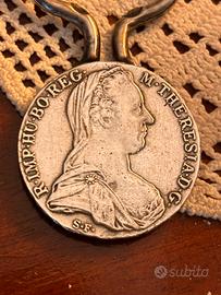 Apribottiglia in argento 835