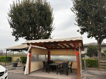 Gazebo con tende elettriche