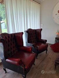 coppia di poltrone chesterfield bergere in pelle b