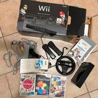 Wii Nintedo "Mario Kart Wii Pack" + 3 giochi.
