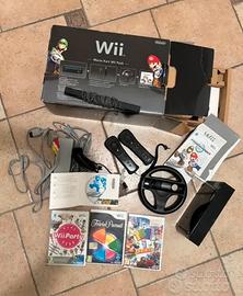 Wii Nintedo "Mario Kart Wii Pack" + 3 giochi.