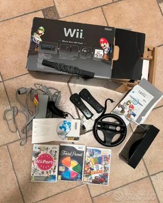 Wii Nintedo "Mario Kart Wii Pack" + 3 giochi.
