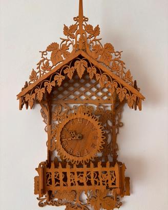 Orologio da parete in legno a traforo