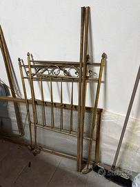 Antica culla in ottone