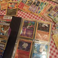 Collezione carte Pokemon album e pack aperti pkm