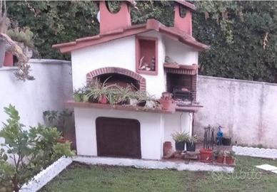 Forno a legna con barbecue 