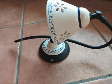 coppia applique ceramica con decoro azzurro 