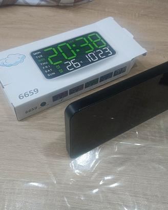 orologio digitale con datario sveglia ecc..