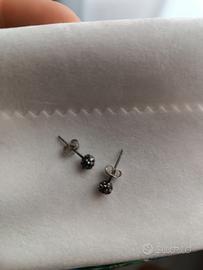 Orecchini punto luce