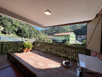 Trilocale con giardino e terrazzo