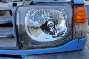 MITSUBISHI PAJERO 1998 - FARO ANTERIORE SINISTRO