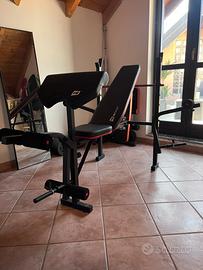 panca completa di pesi manubri e bilancieri