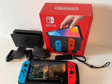 Nintendo switch Oled con accessori e gioco