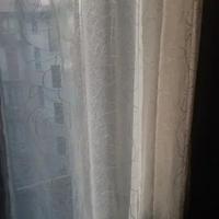 Tende bianche ad anelli